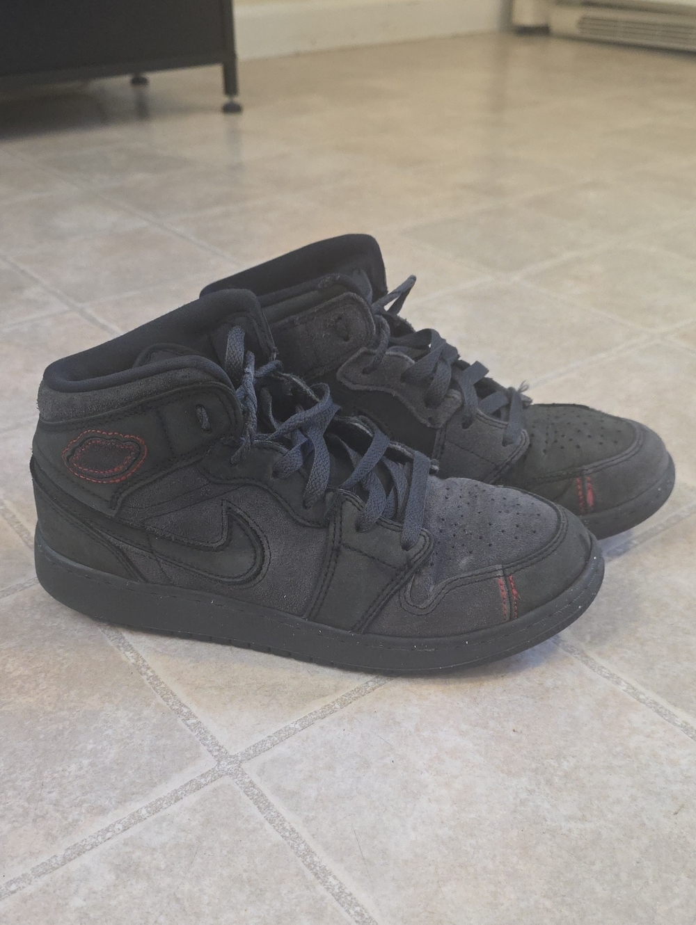 Nike Kids Black High-Top Sneakers with Red Accents